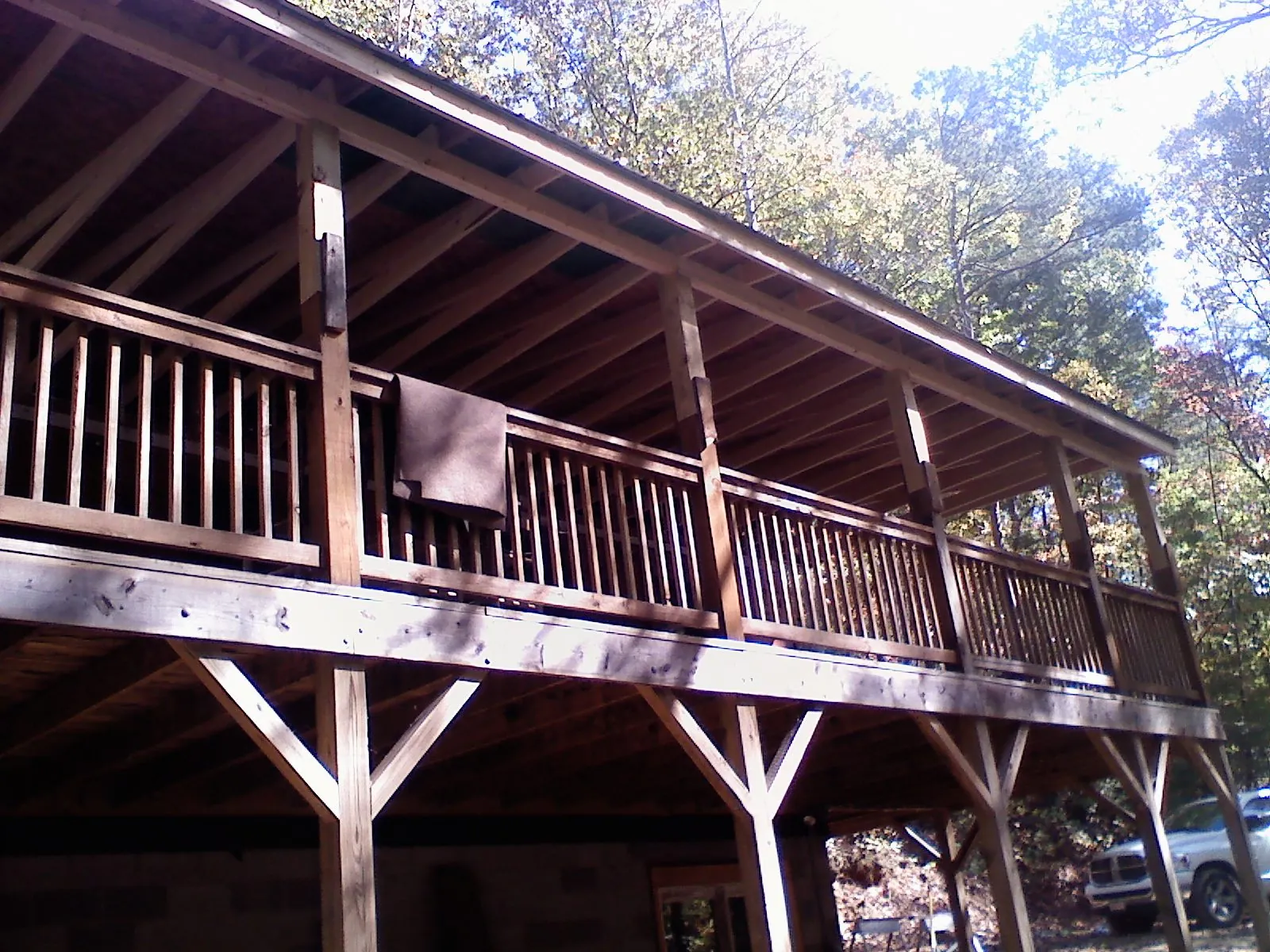Timber framing under a new elevated porch and deck — Roof Leak Repair in East Canton by Roofing Brothers